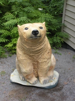 Polar bear sitting on Ice
